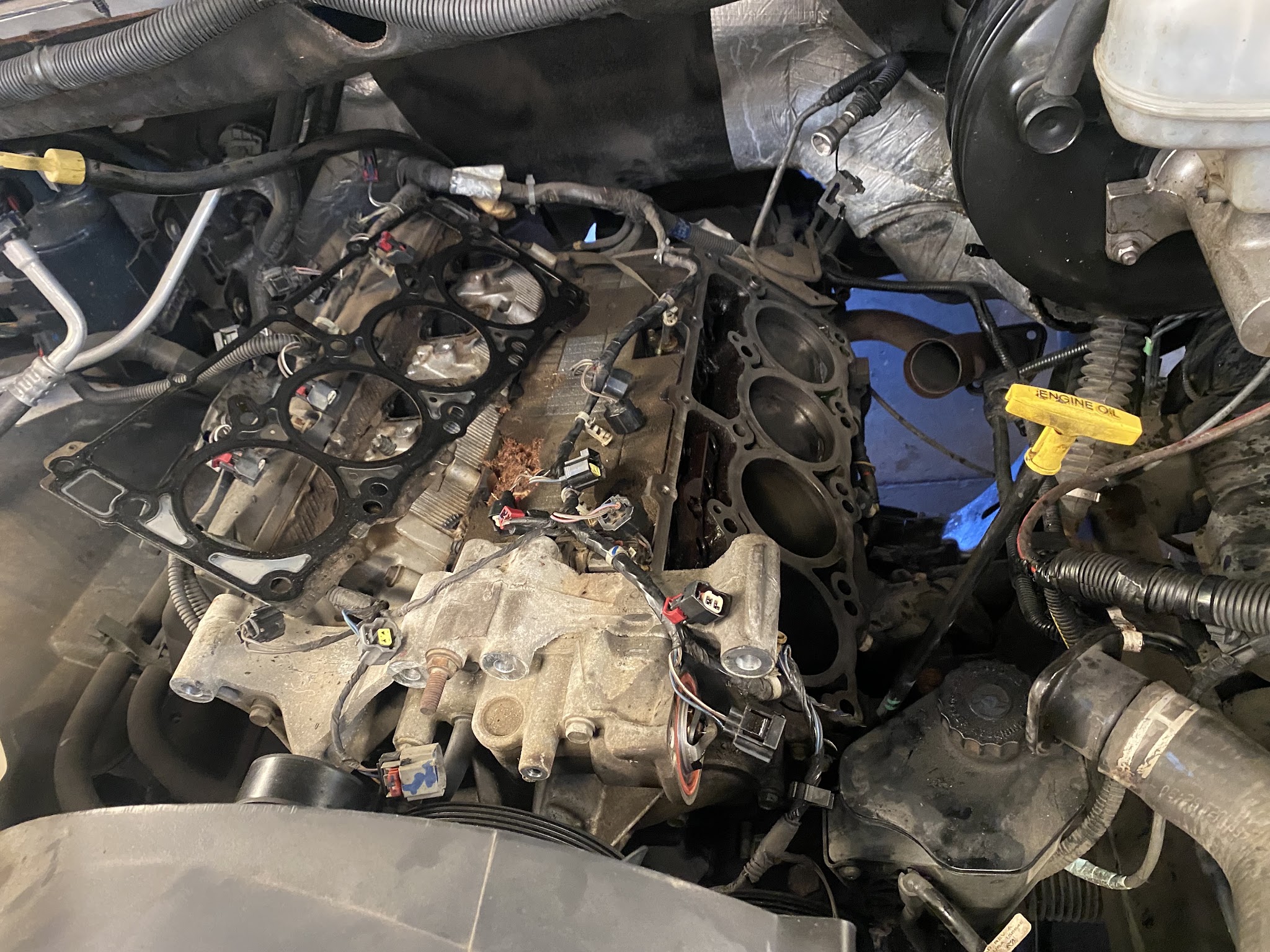Engine bay stripped down during a repair